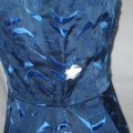 Early 1960s vintage satin dress had a hole at the side